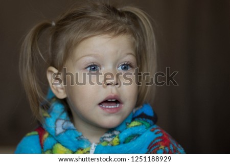 child with interrogative face