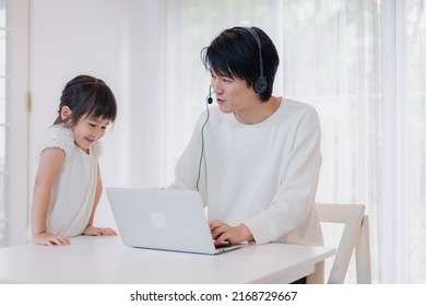 Child Interrupts Father Working From Home