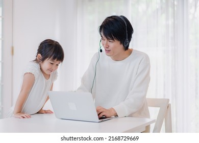 Child Interrupts Father Working From Home