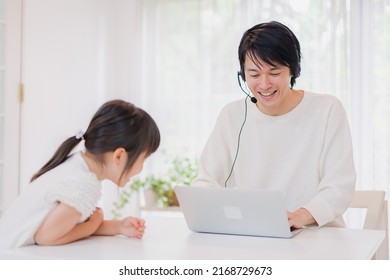 Child Interrupts Father Working From Home