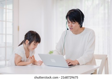 Child Interrupts Father Working From Home