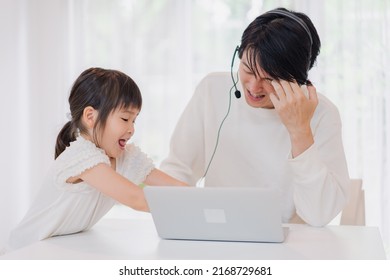 Child Interrupts Father Working From Home