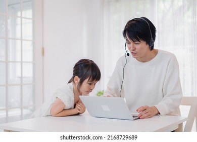 Child Interrupts Father Working From Home