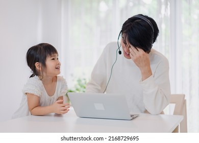 Child Interrupts Father Working From Home