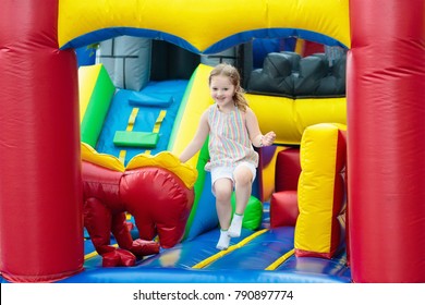 Child Jumping On Colorful Playground Trampoline Stock Photo 790897774 ...