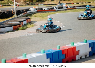 Child In A Kart On A Kart Track. Child Goes Karting 