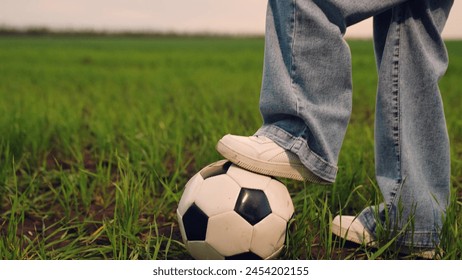 child kid baby girl run across green lawn sunset, kicking soccer ball, playing football field, childhood dream happy kid, outdoor soccer practice, grass field football, youth soccer training, casual - Powered by Shutterstock