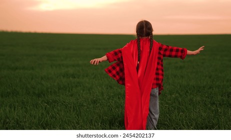 child kid baby girl runs sunset superhero costume sunset park, children dream happy kid, red cloak fantasy, playful victory, outdoor games, sunset hero, victory in field, outdoor hero, sunset - Powered by Shutterstock