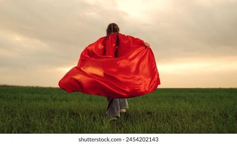 child kid baby girl runs sunset superhero costume sunset park, children dream happy kid, sunset adventure, red cloak fantasy, determined child, park excitement, speed and joy, dynamic sunset, flight - Powered by Shutterstock