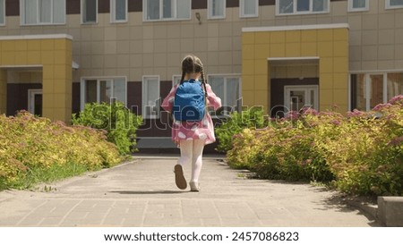 child kid girl daughter running school backpack, returning from school from lessons, children education school yard house running leg, sunny childhood play, preschooler at play, joyful run outside