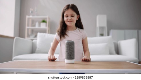 Child Kid Using Smart Speaker And Voice Assistant - Powered by Shutterstock