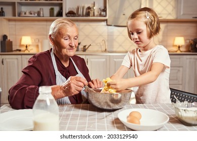 Child Kneading Dough With Hands Before Her Granny