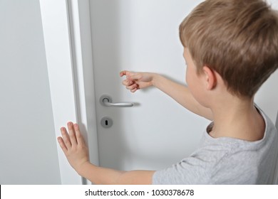 Child Knocking On Door Before Entering, Home Privacy Concept. Family Behavior Rules During Coronavirus Quarantine.