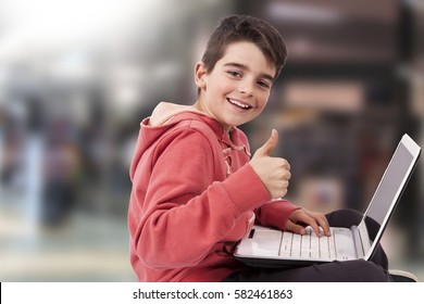 Child With Laptop Computer