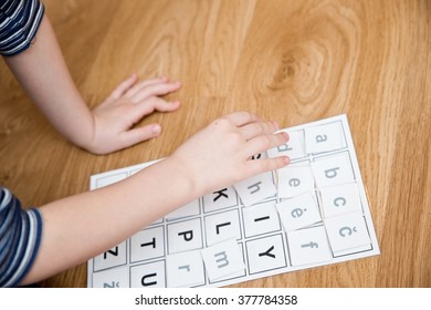 Child learn letters. Alphabet.