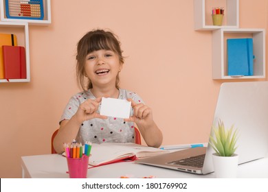 Child Learning English Virtual. Home Classroom. Kids Homeschooling Online. Happy Child Holding Empty Blank Card