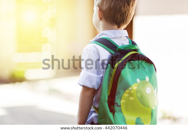 Child\
leaving home to his first day of\
kindergarten