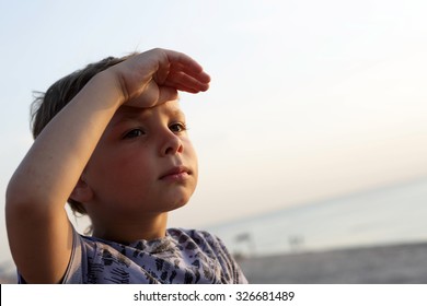 https://image.shutterstock.com/image-photo/child-looking-out-hand-over-260nw-326681489.jpg
