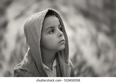 Child Looking Up, Behind It Is An Abstract Natural Backgrounds 