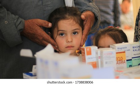 A Child Looks At The Doctor In Al-Bab, Syria At 20 October 2019