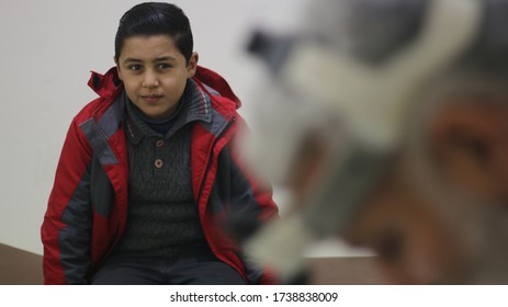 A Child Looks At The Doctor In Al-Bab, Syria At 20 October 2019