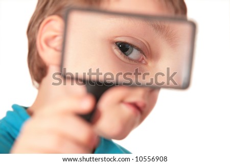 Similar – Child with reading magnifier