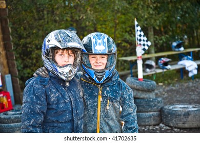 Child Loves To Race With A Quad Bike At The Muddy Quad Track