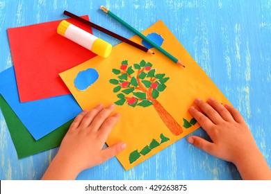 Child made an apple tree  clouds  grass out paper  Easy   fun craft for kids: torn paper collage  Paper tree ornament  Summer activities for kindergarten  Hand applique tutorial