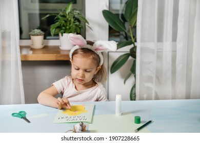 Child Making Easter Egg Gift Card With A Bunny From Paper