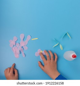 Child Making Flower From Paper, Top View, Easter Crafts DIY