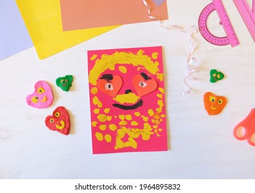 Child Making Homemade Greeting Card From Paper. Gift For Mothers Day, Fathers Day, Birthday Or Valentines Day.  Kid Craft. Home Education Game. Early Development Concept