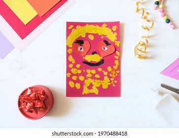 Child Making Homemade Greeting Card From Paper. Gift For Mothers Day, Fathers Day, Birthday Or Valentines Day.  Kid Craft. Home Education Game. Early Development Concept