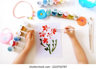Child making homemade greeting card. little girl creating card for mom gift for Mothers day, Birthday or Valentines day . Arts  crafts concept. - Shutterstock ID 2223763787