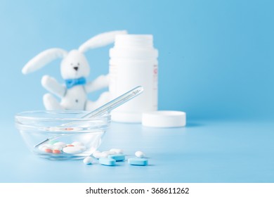 Child Medicine And Toy Rabbit