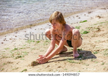 Similar – One happy little boy playing on the beach