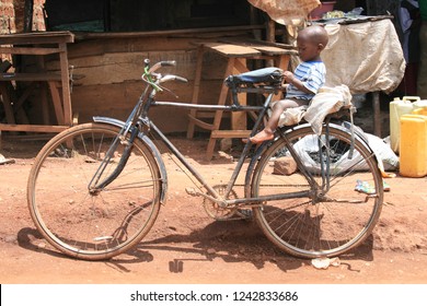 Child On A Bike - Uganda Kampala