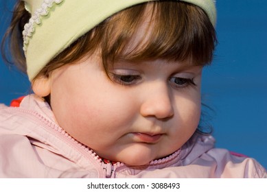 Child on blue sky background - Shutterstock ID 3088493