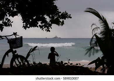 A Child On The La Digue Island Of The Seychelles