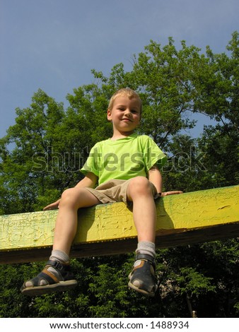 child on log