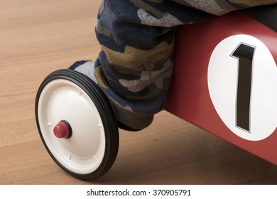 child on the tricycle - Powered by Shutterstock