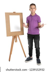 Child Painting Picture On Easel Against White Background. Space For Text