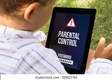 Child With Parental Control At A Tablet