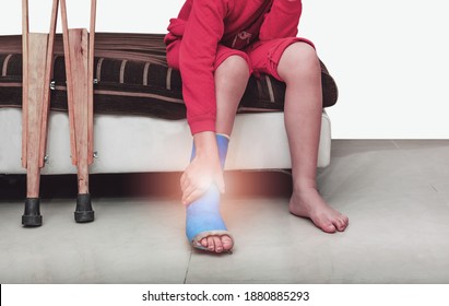 Child Patient In Splint Leg Compression Knee Brace Support Injury On The Bed In Nursing Hospital.healthcare And Medical Support.