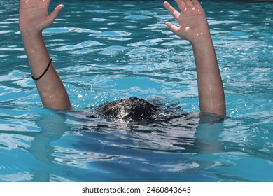 Child person kids the victim drowned because could not swim in the pool drowning , hand up water swimming  - Powered by Shutterstock