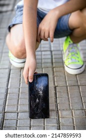 Child Picking Up Broken Smartphone From The Floor, Broken Cell Phone Screen, Cracked Protective Film