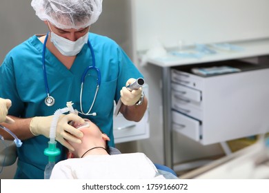 The Child Is Placed Under Anesthesia Before The Operation. Introduction Of A Breathing Tube Into The Trachea. Concept Of Health Care And Life Saving. Copy Space.