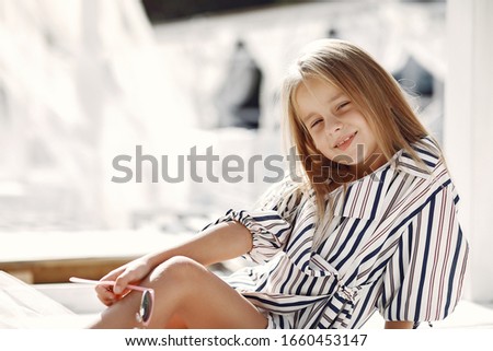 Similar – Image, Stock Photo happy kid girl relaxing in new house.