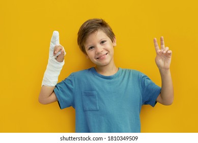 A Child With A Plaster On His Hand. Copy Space