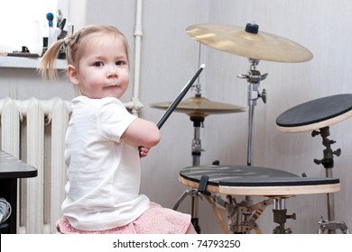 Child Playing Drums