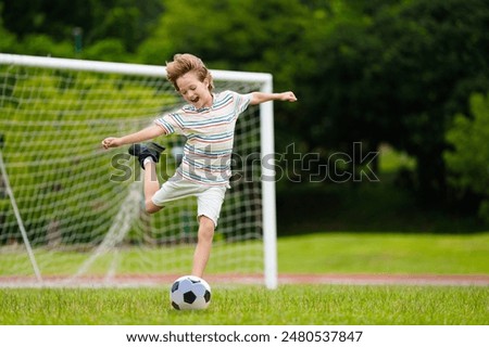 Similar – Image, Stock Photo Child playing on outdoor playground. Toddler plays on school or kindergarten yard. Active kid on stone sculpured slide. Healthy summer activity for children. Little boy climbing outdoors.